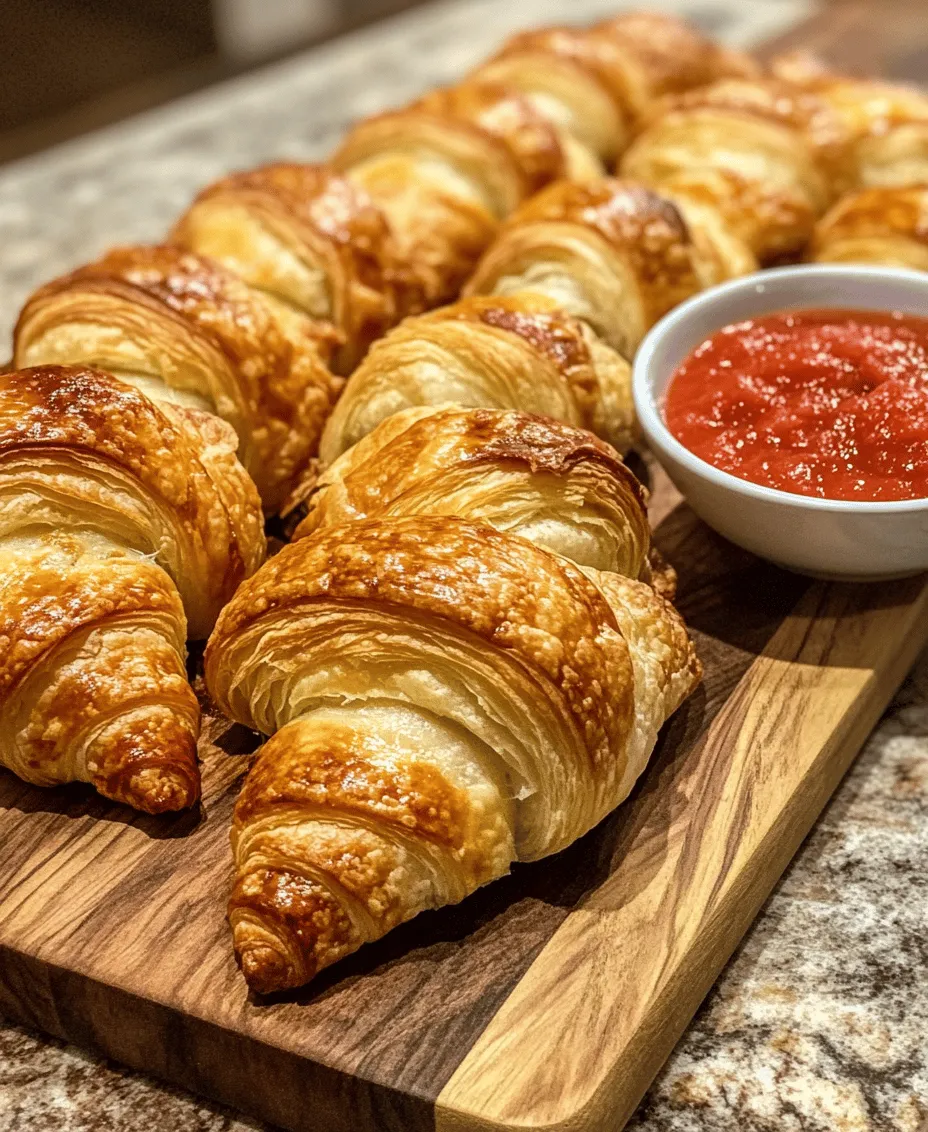 Are you ready to indulge in a delightful culinary creation that promises to elevate your snacking game? Say hello to Mozzarella Pepperoni Croissant Rolls! This appetizing dish marries the buttery, flaky goodness of croissant dough with the gooey, stretchy charm of mozzarella cheese and the savory kick of pepperoni. Whether you're planning a casual get-together, a game day party, or simply craving a quick and satisfying snack, these croissant rolls are sure to impress.